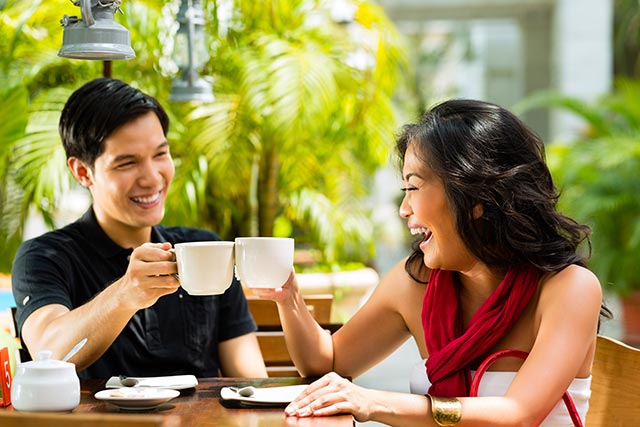 Asian-man-and-woman-in-restaurant-or-cafe